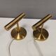 A set of stylish brass wall lamps from Danish Darø