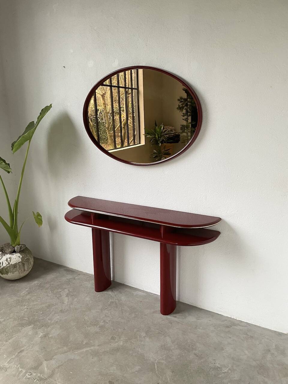 Red lacquered console and its mirror from the 80s