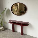 Red lacquered console and its mirror from the 80s