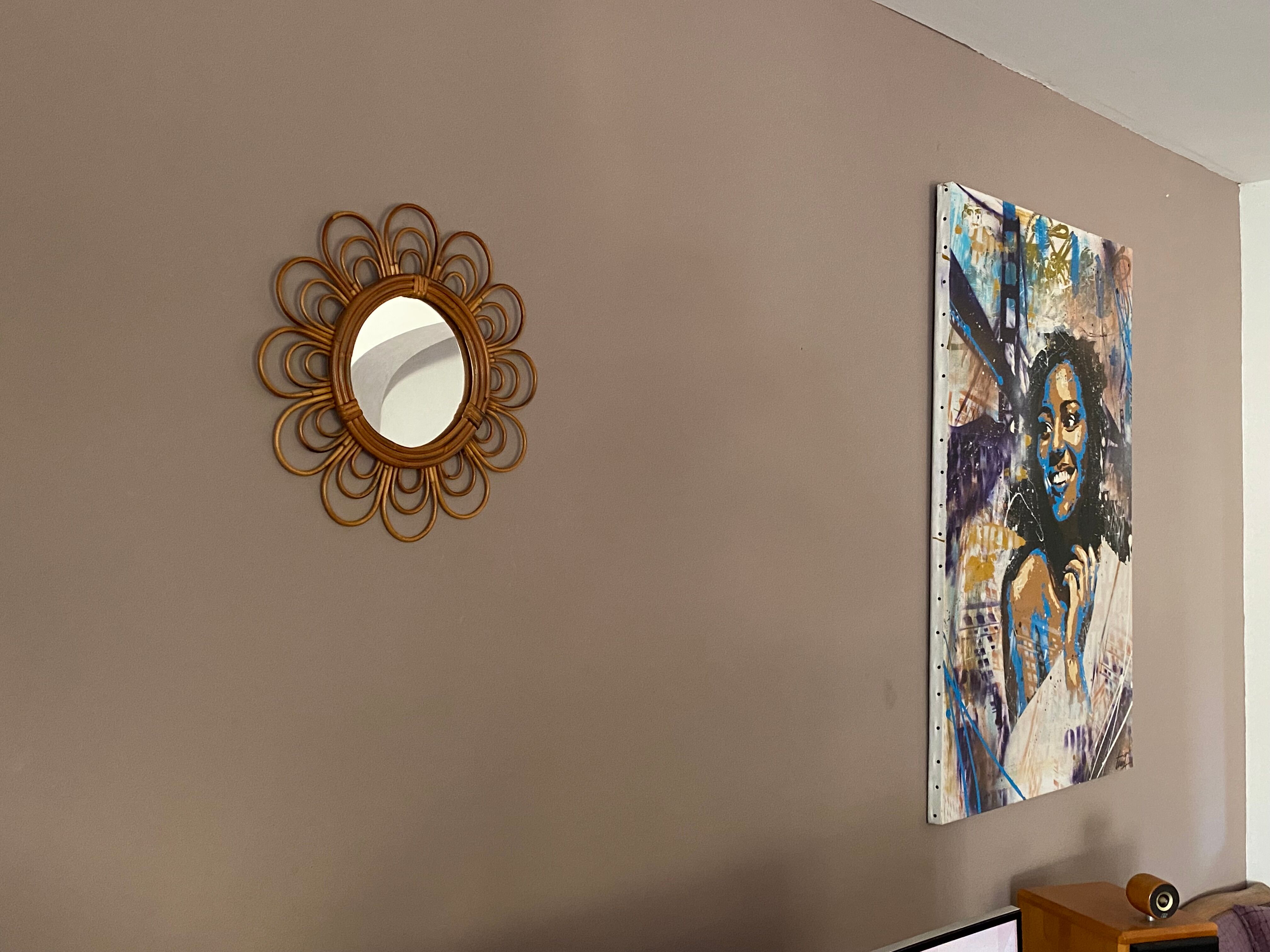 Sun mirror in arched rattan. 40cm. 1960.