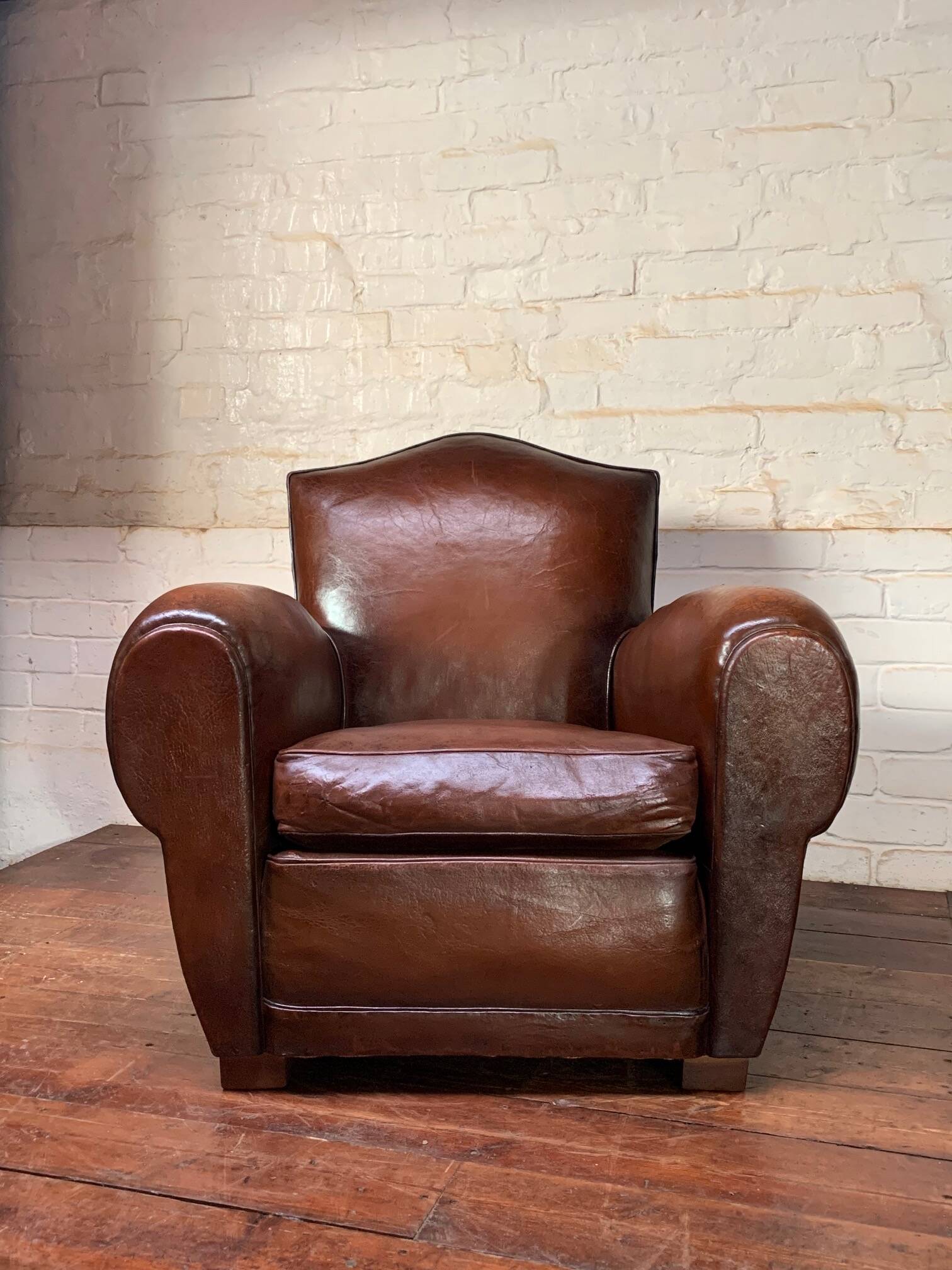French leather club chair, chapeau de gendarme model circa 1950’s