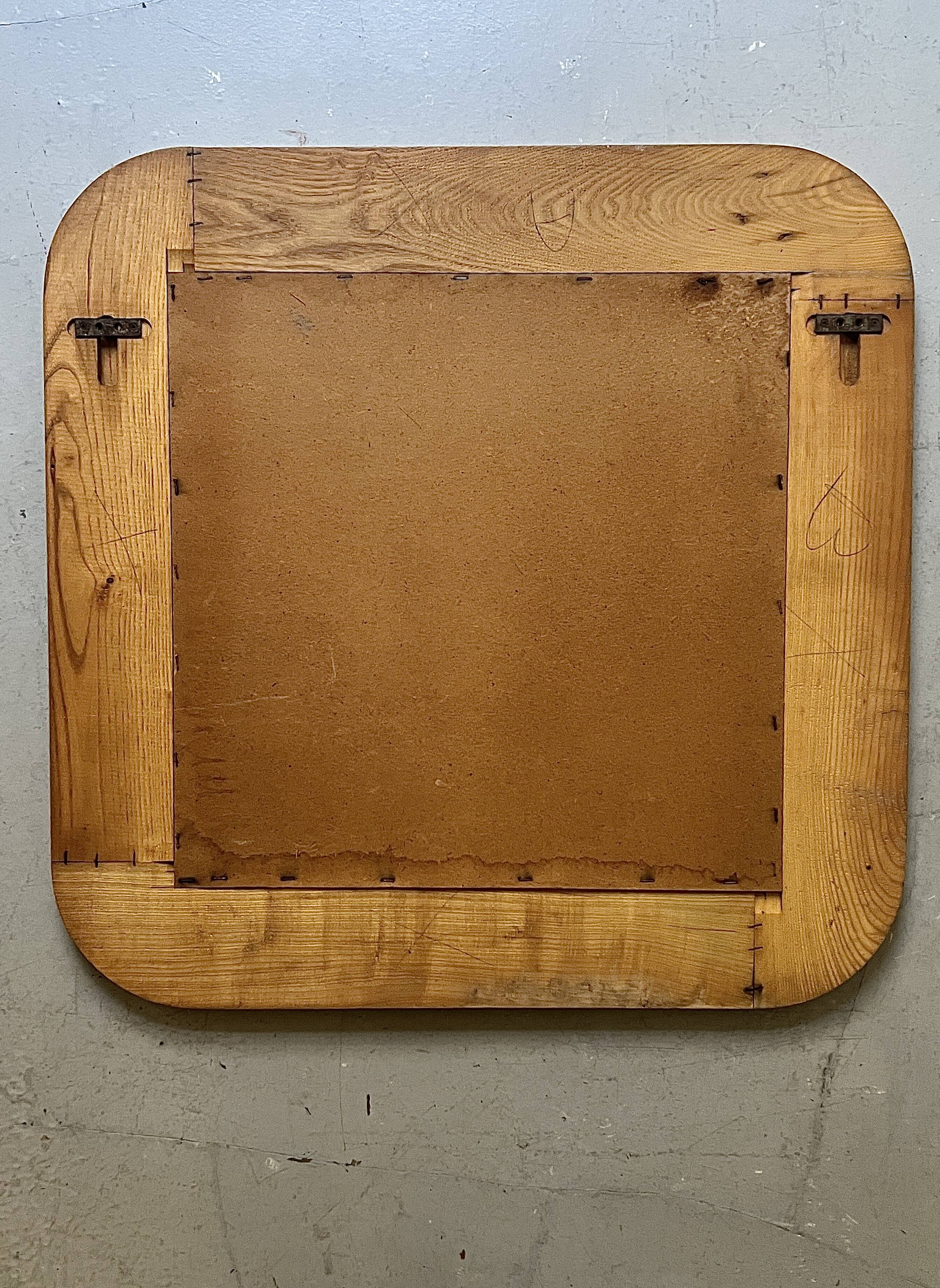 Large oak mirror in the style of a revival house, 1970s design.