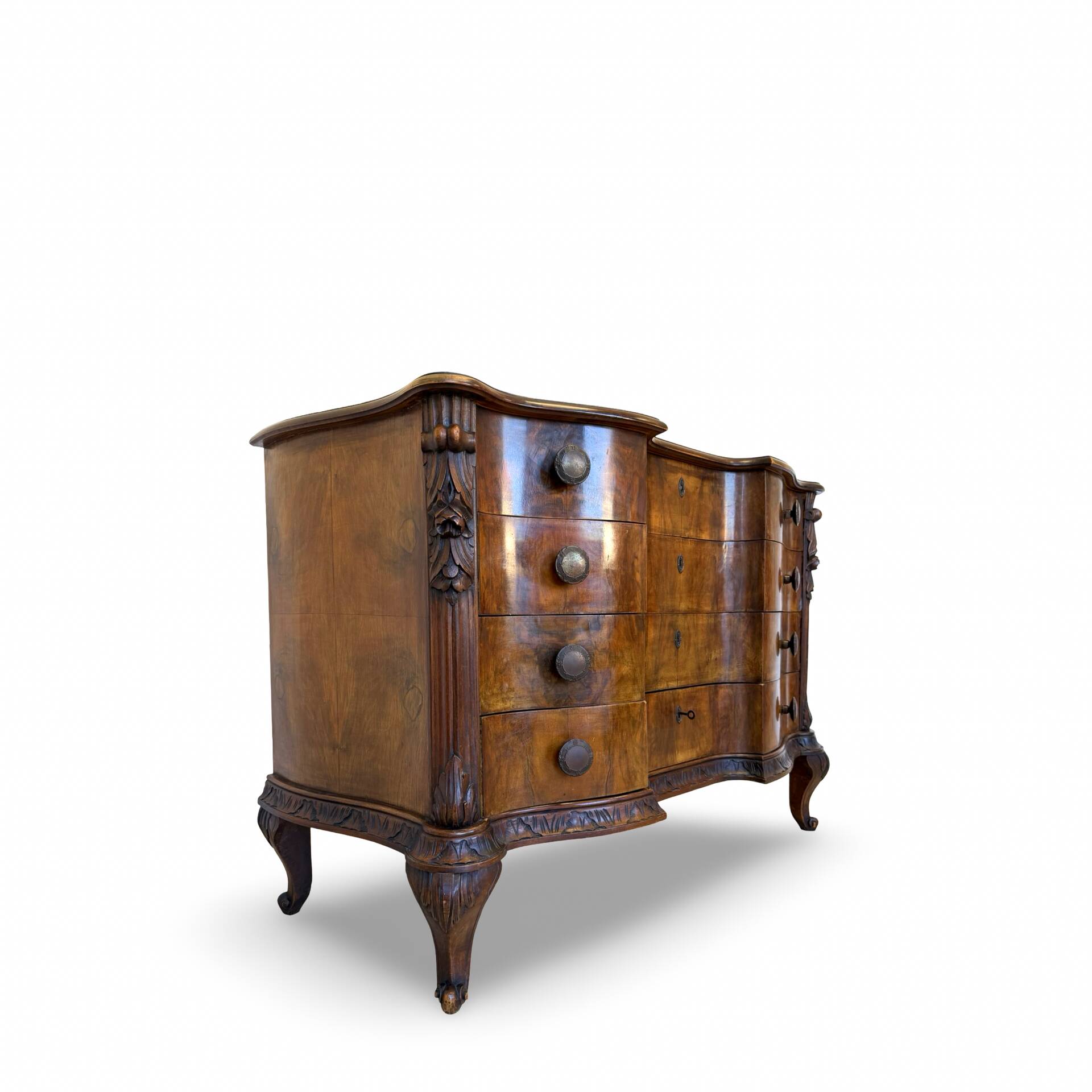 serpentine commode in antique walnut