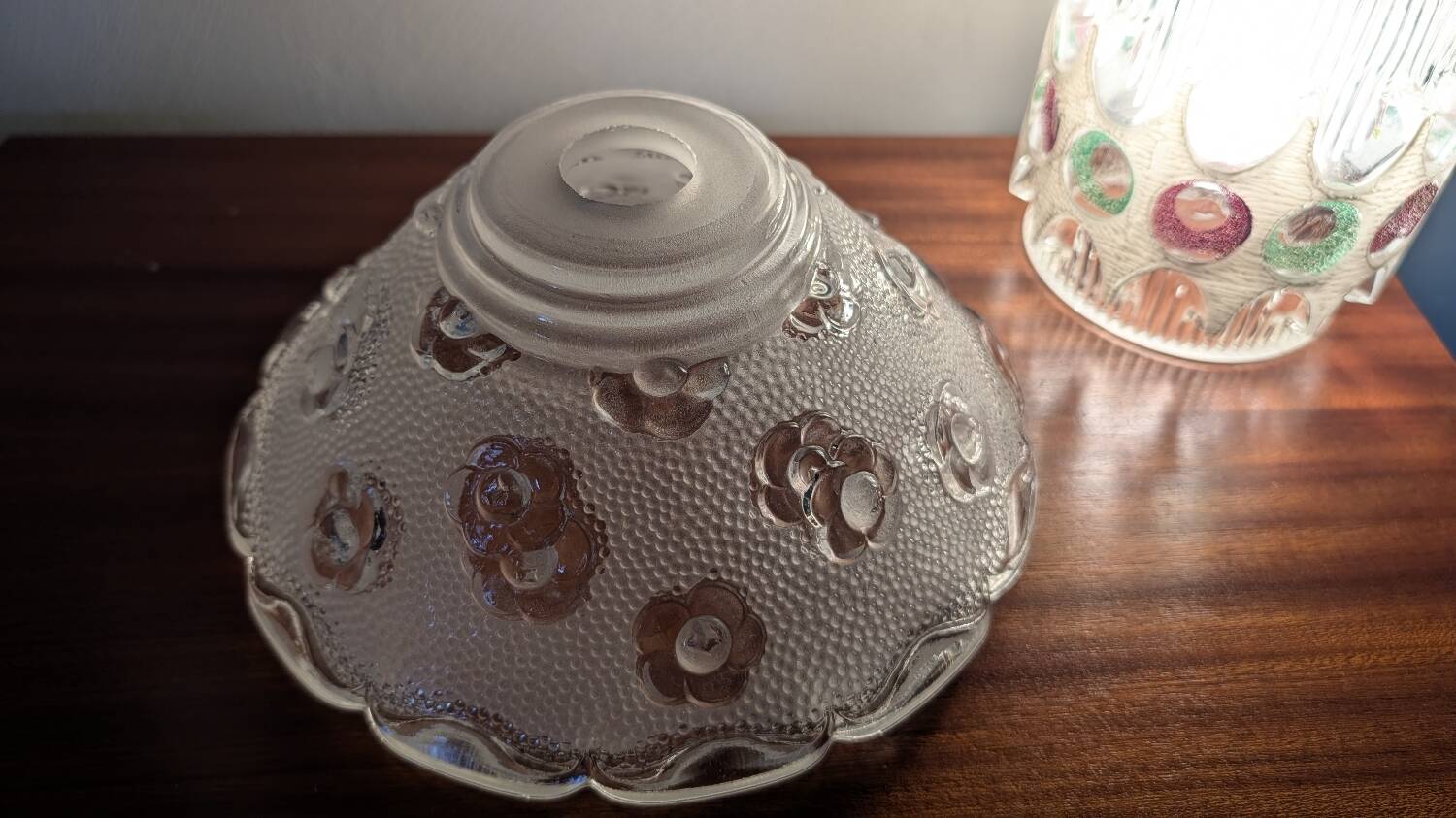 Moulded glass lampshade with floral decoration, granite texture.