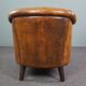 Club chair in patinated sheepskin