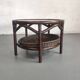 Vintage rattan coffee table with smoked glass top and rattan basket shelf