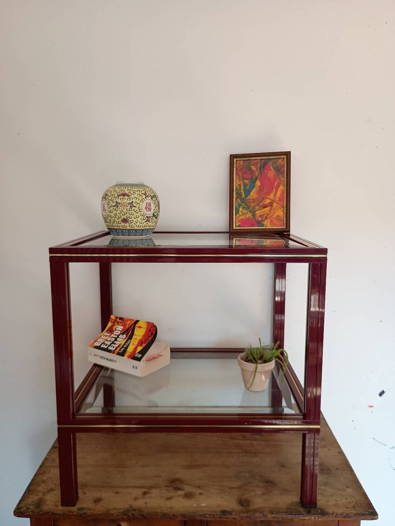 Side table in glass and brass