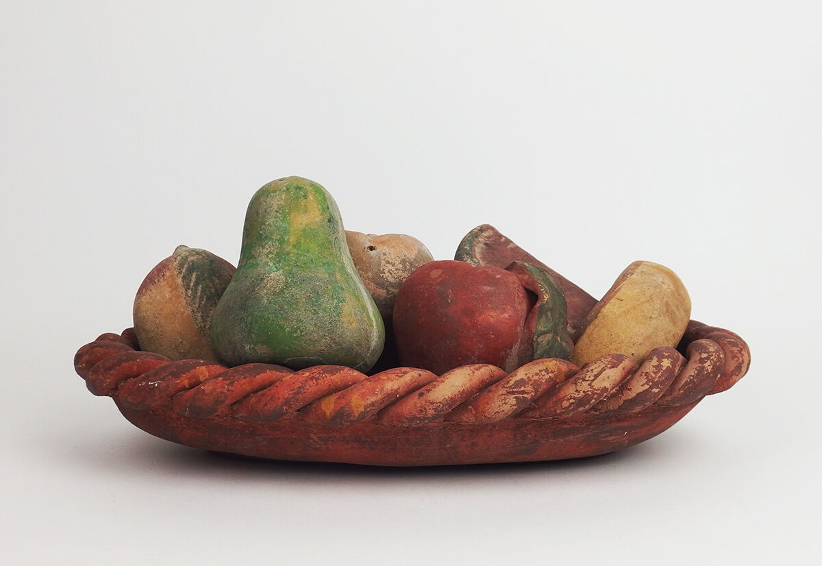 Basket and terracotta fruit