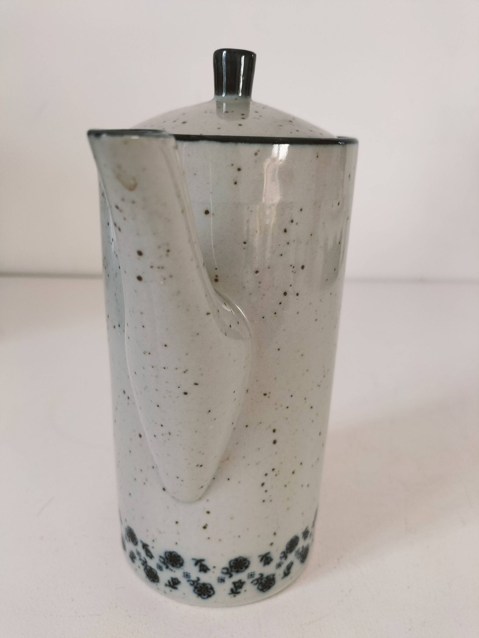 Vintage speckled stoneware coffee pot – navy blue floral decoration