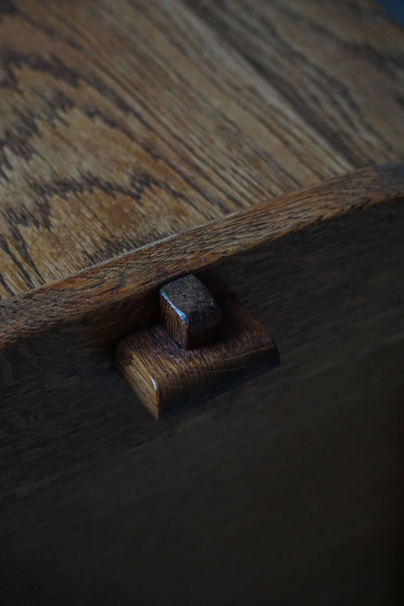 Modern Danish oak commode with decorative relief sculpture, mid-20th century.