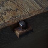 Modern Danish oak commode with decorative relief sculpture, mid-20th century.