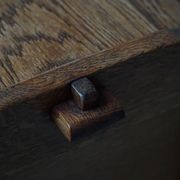Modern Danish oak commode with decorative relief sculpture, mid-20th century.