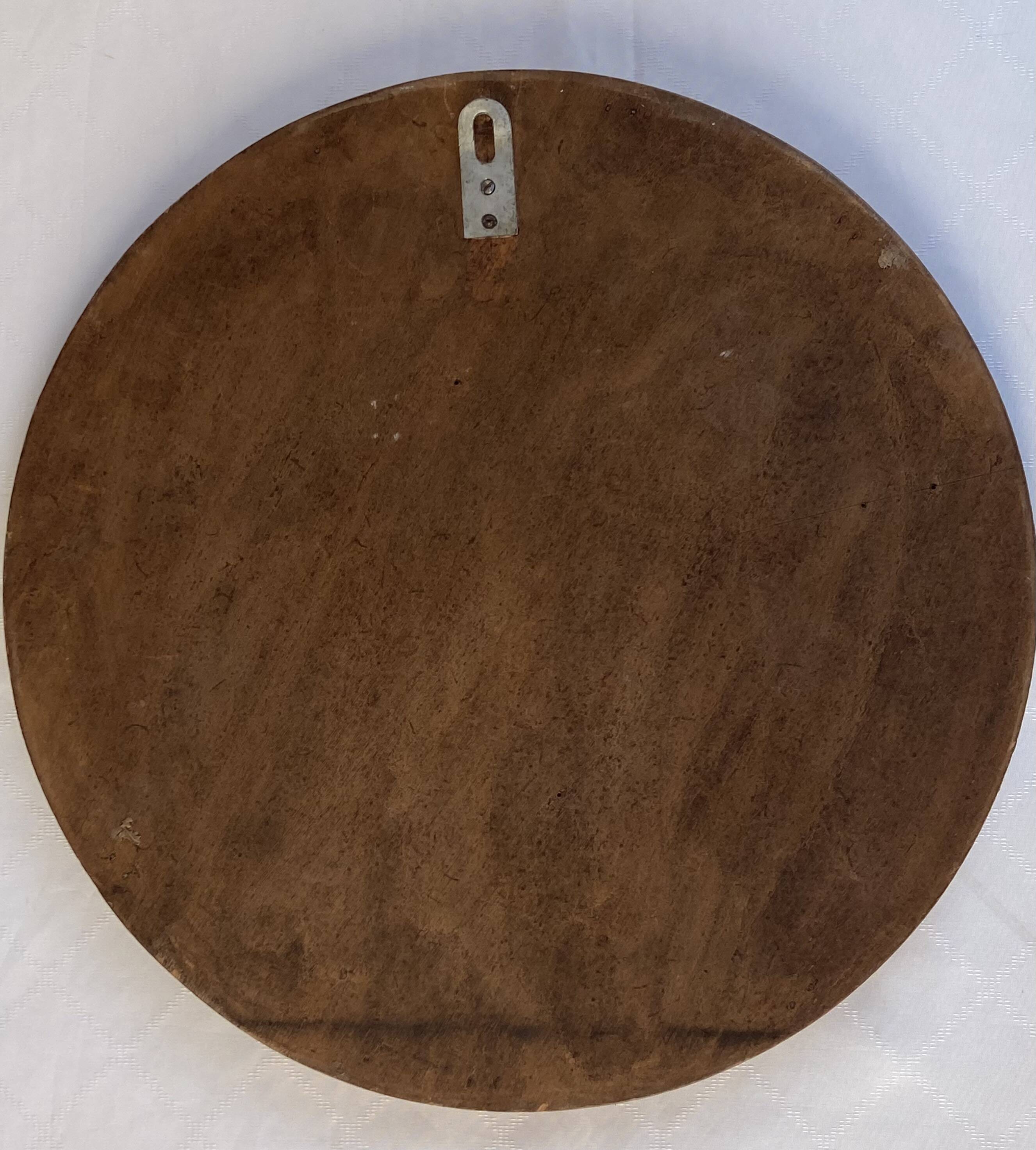 Ceramic mirror by Raymonde Leduc from the 1960s.