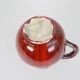 Large red and blue glazed ceramic pitcher signed Delène under the base