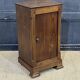 Chestnut bedside table from the early 20th century.