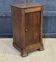 Chestnut bedside table from the early 20th century.