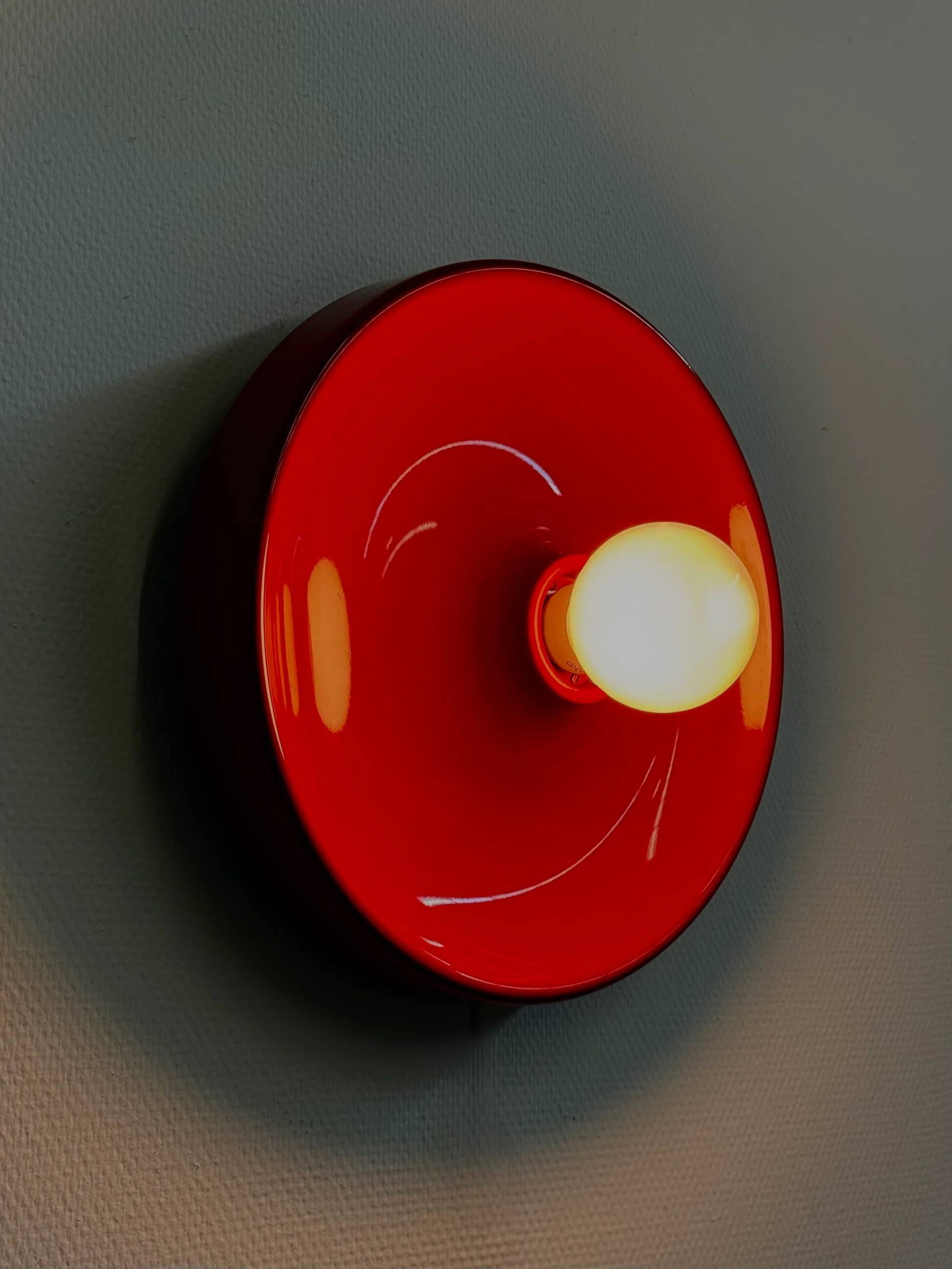 Red space age disc lamp by Enrico Tronconi