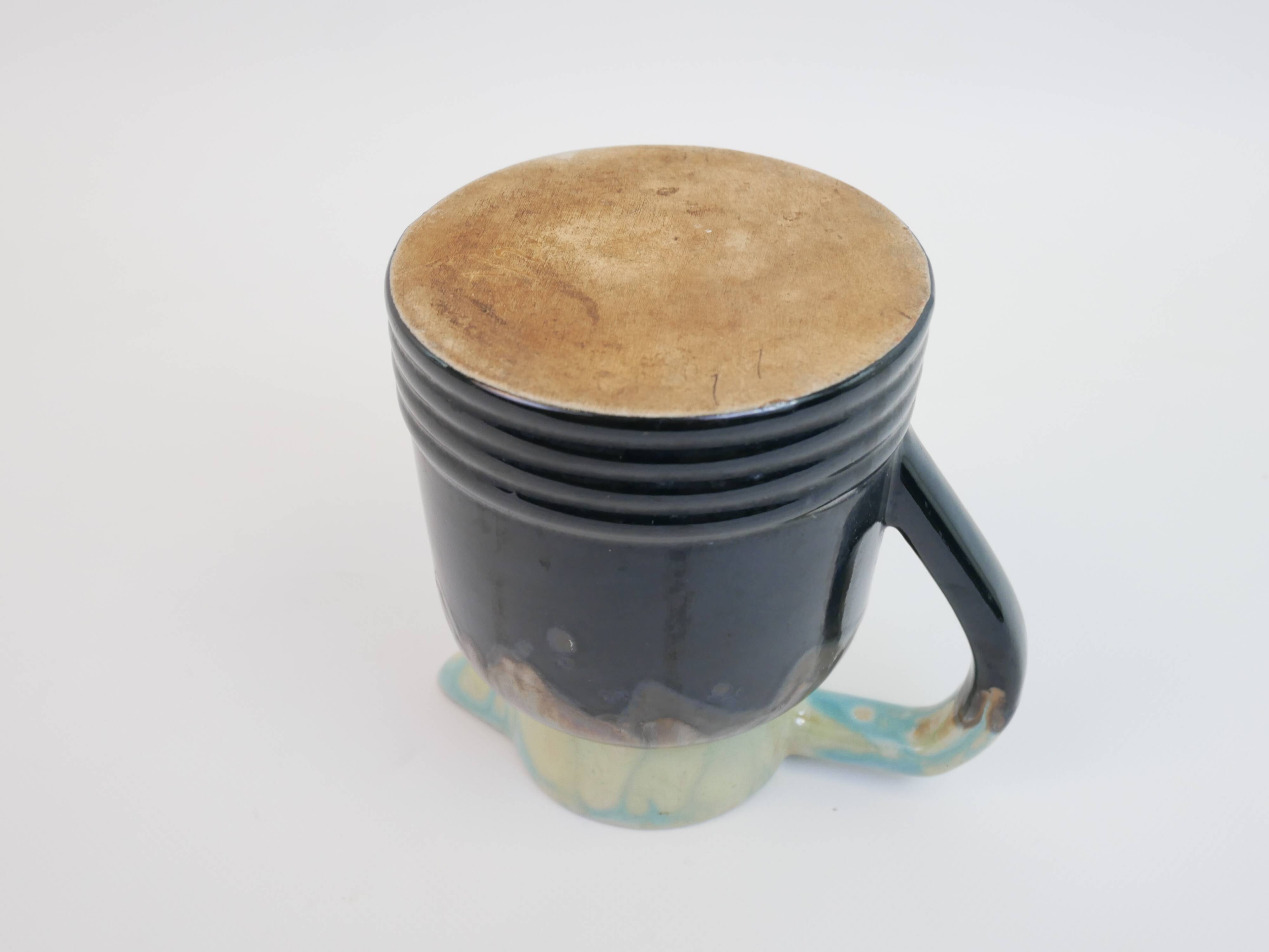 Art Deco pitcher in black, brown and blue glazed ceramic