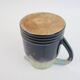 Art Deco pitcher in black, brown and blue glazed ceramic
