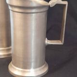 Set of 3 pewter pitchers 95%