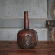 Vintage African wooden carved gourd bottle.