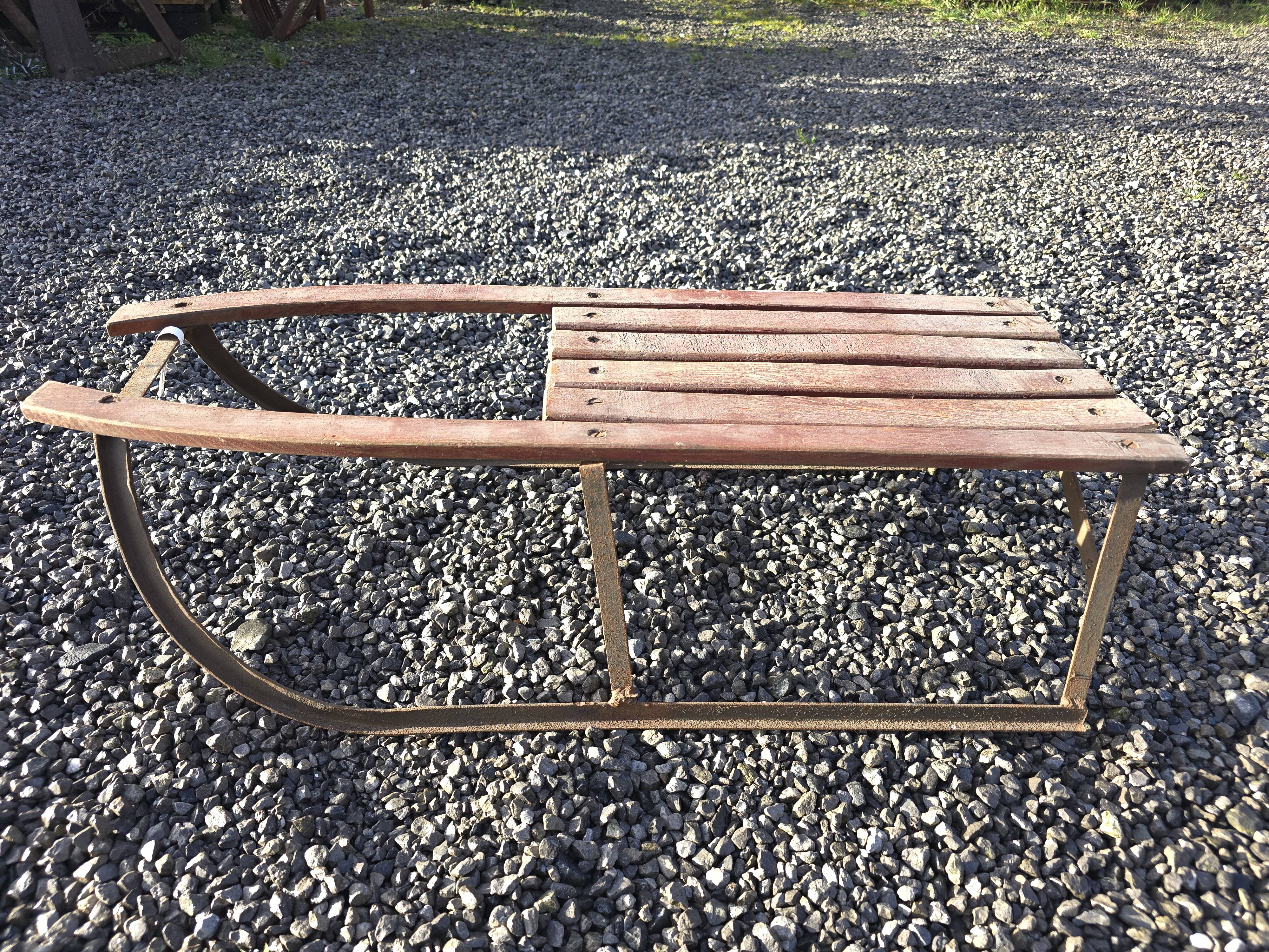 Vintage wooden and iron sled