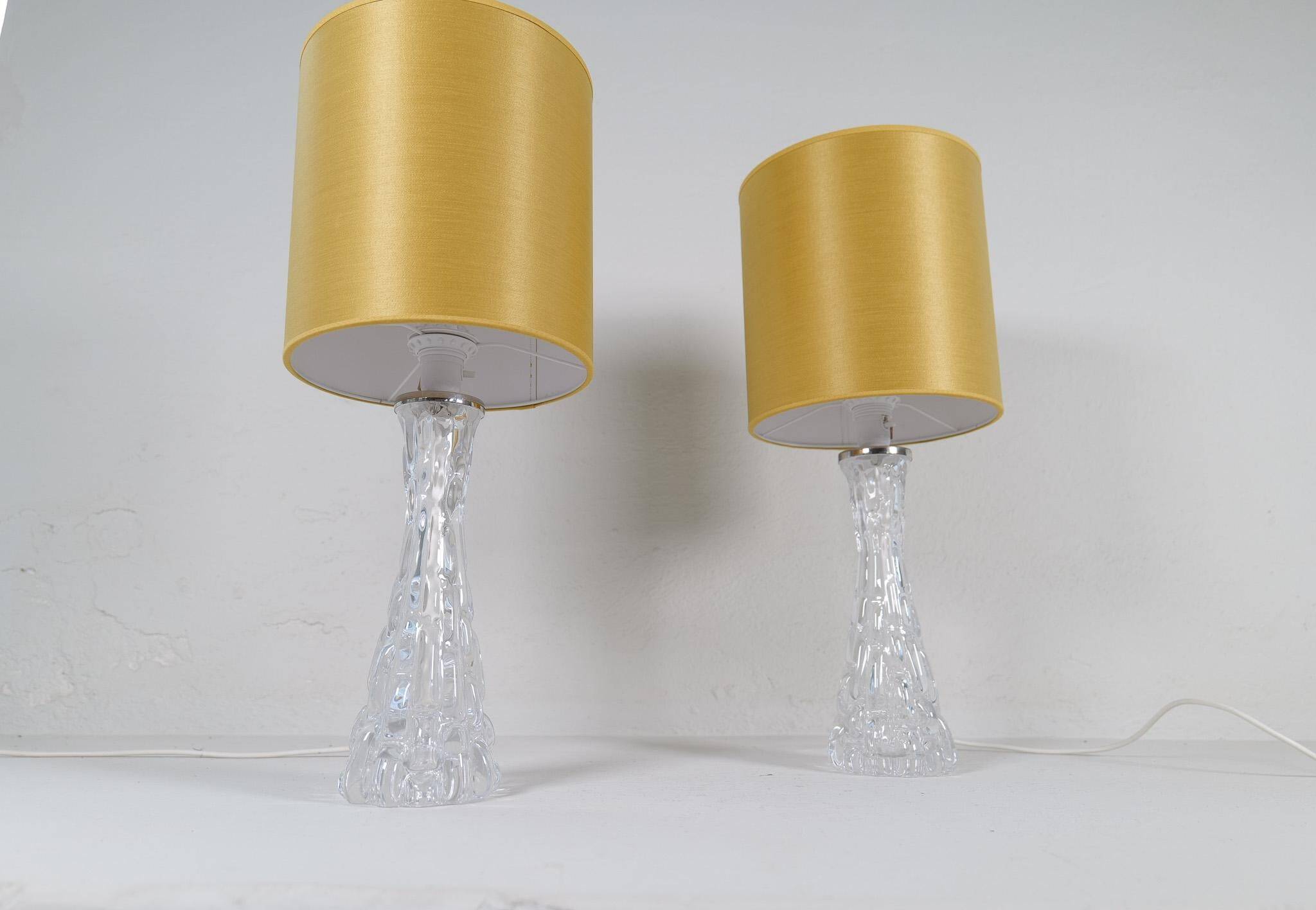 Mid-century modern crystal table lamps by Orrefors, designed by Carl Fagerlund, Sweden, 1970s.