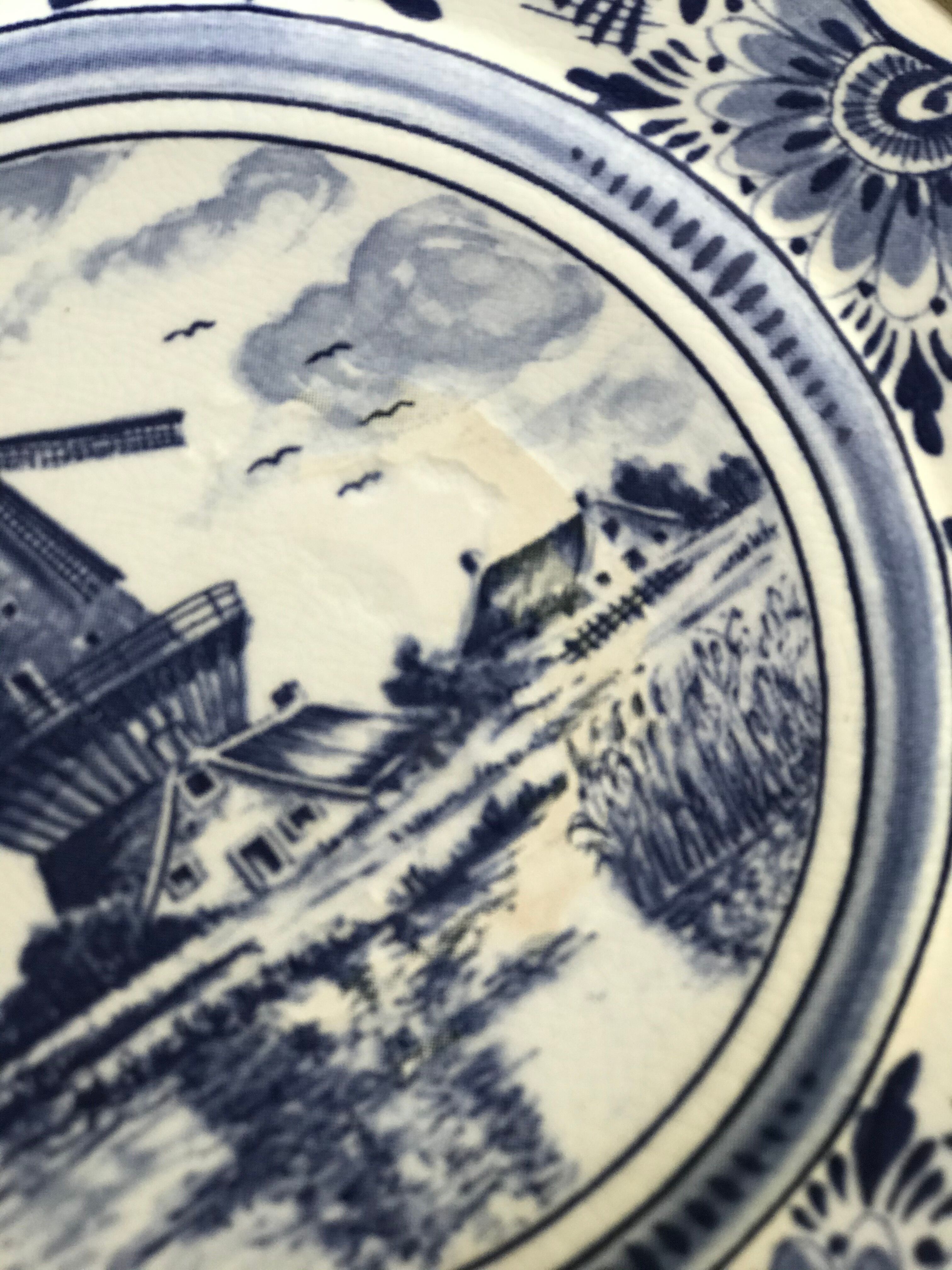 Lot of 4 dessert plates in white porcelain and Dutch mill design