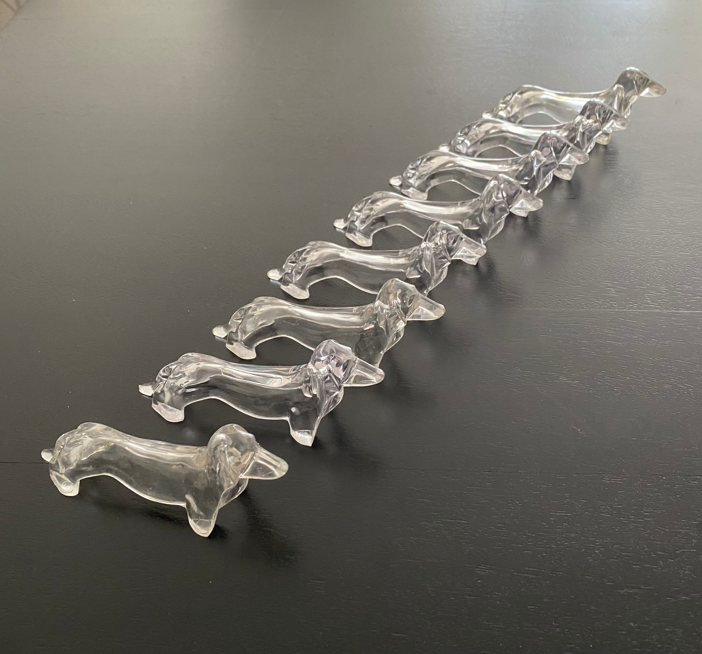 8 plastic knife holders, 70s, dachshund shape