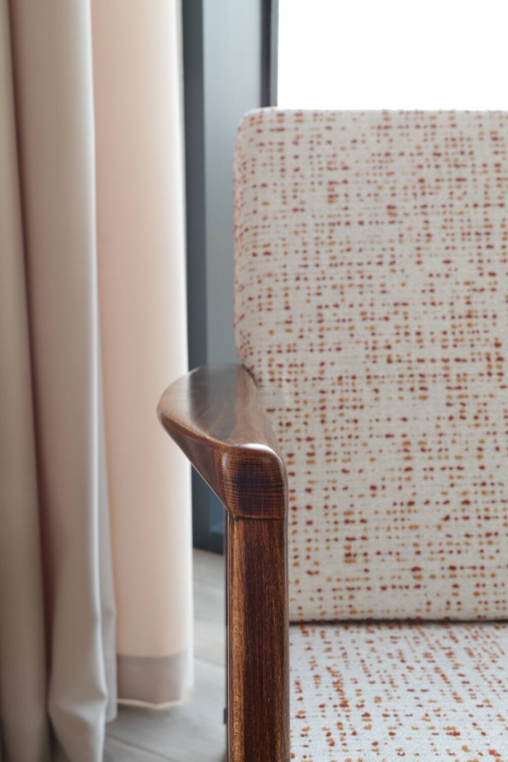 Vintage Danish boucle armchair with orange polka dots from the 1960s.