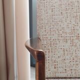 Vintage Danish boucle armchair with orange polka dots from the 1960s.