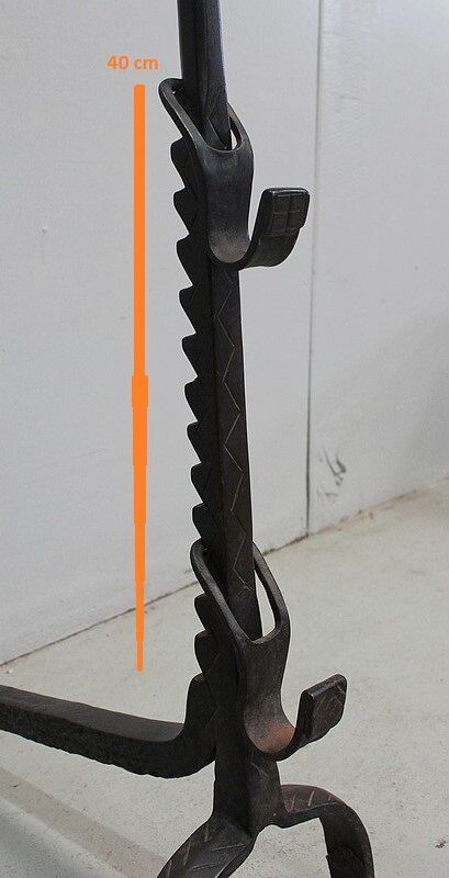 Pair of wrought iron chenets - late nineteenth century