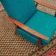 Turquoise armchair with folding footrest, 1960s