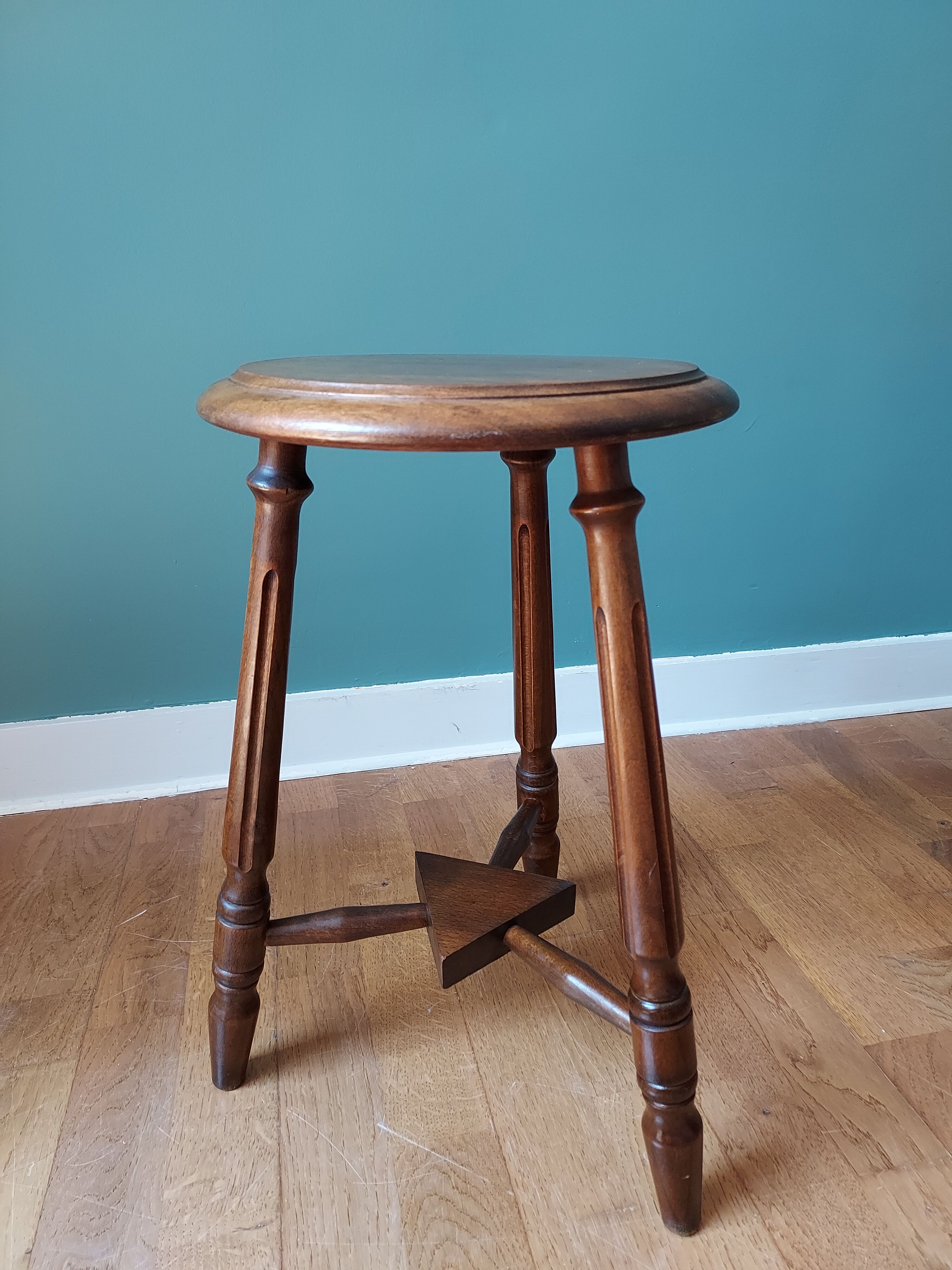 Carved tripod stool