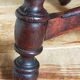 Antique stool in turned and carved solid wood