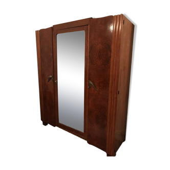 Wooden cabinet with its mirror
