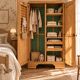 Parisian Art Deco wardrobe, renovated with raw wood.