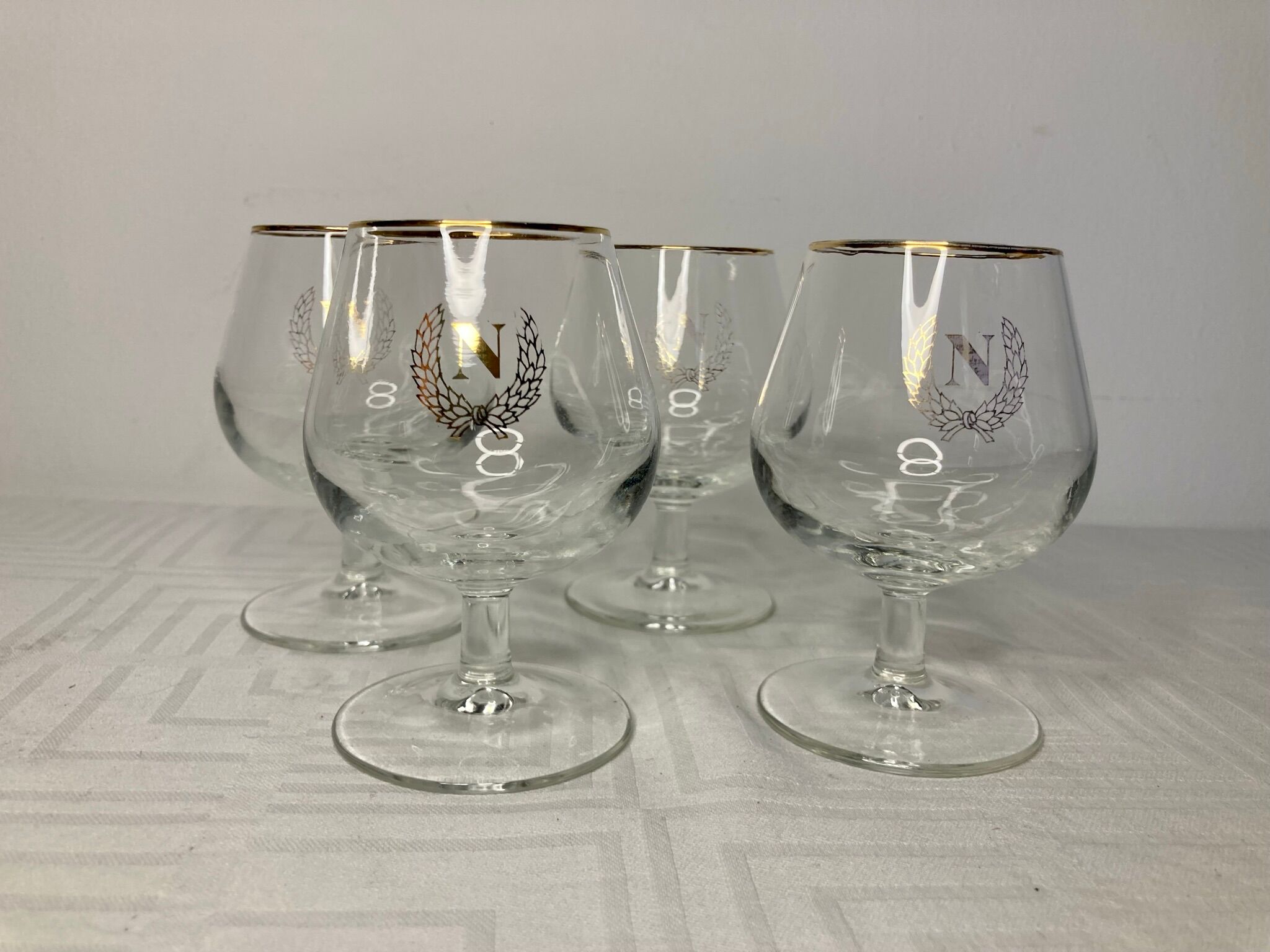 Série de quatre verres à cognac fine Napoléon
