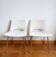 Pair of boucle chairs by Georges Frydman 1960