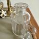 Glass bottle and its glass stopper