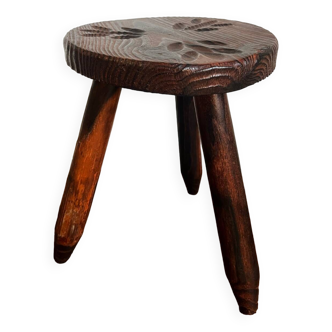 Carved wooden tripod stool