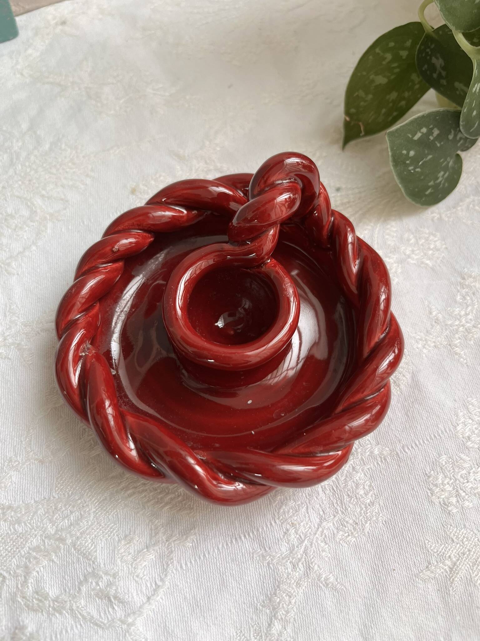 Twisted red earthenware candle holder - in the style of St Clément