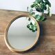 Miroir ovale doré 46x65cm