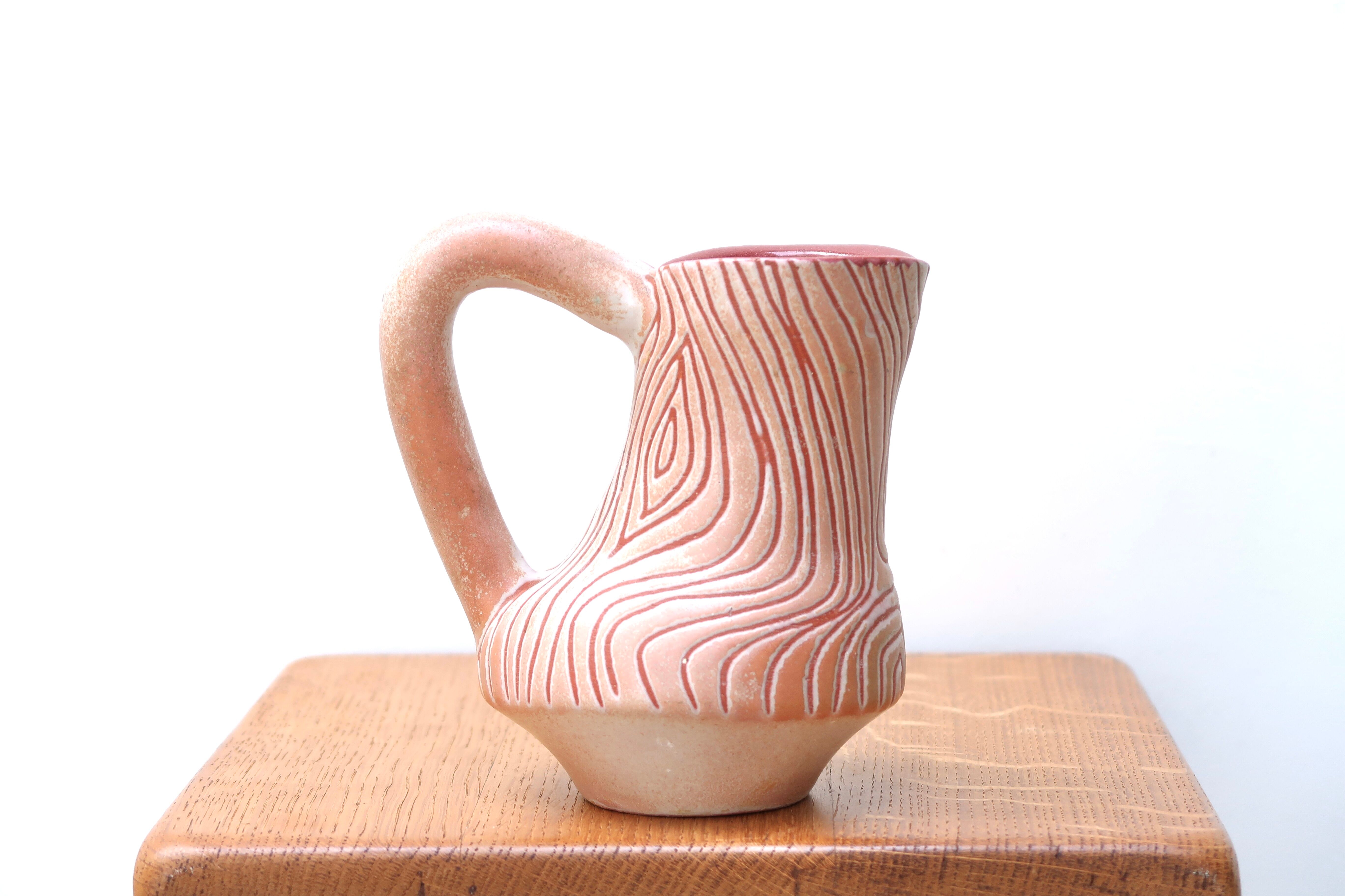 Pink scarified pitcher by Henry Algan, 60s