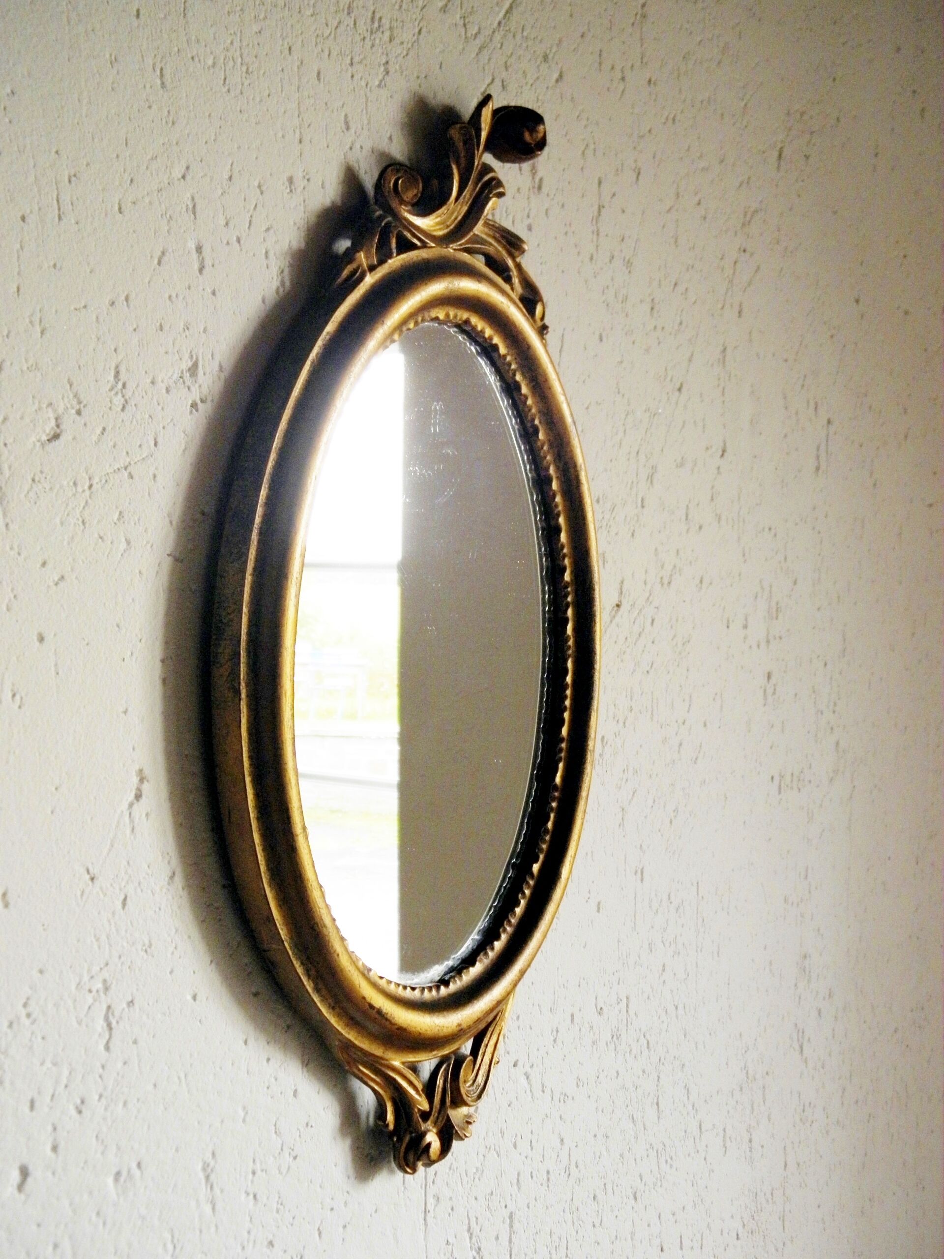 Miroir italien ovale en bois doré - 45x25cm