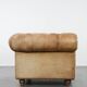 Chesterfield armchair made of cowhide leather in a light cognac colour