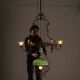 Antique adjustable height chandelier with original glasswork and brass detailing
