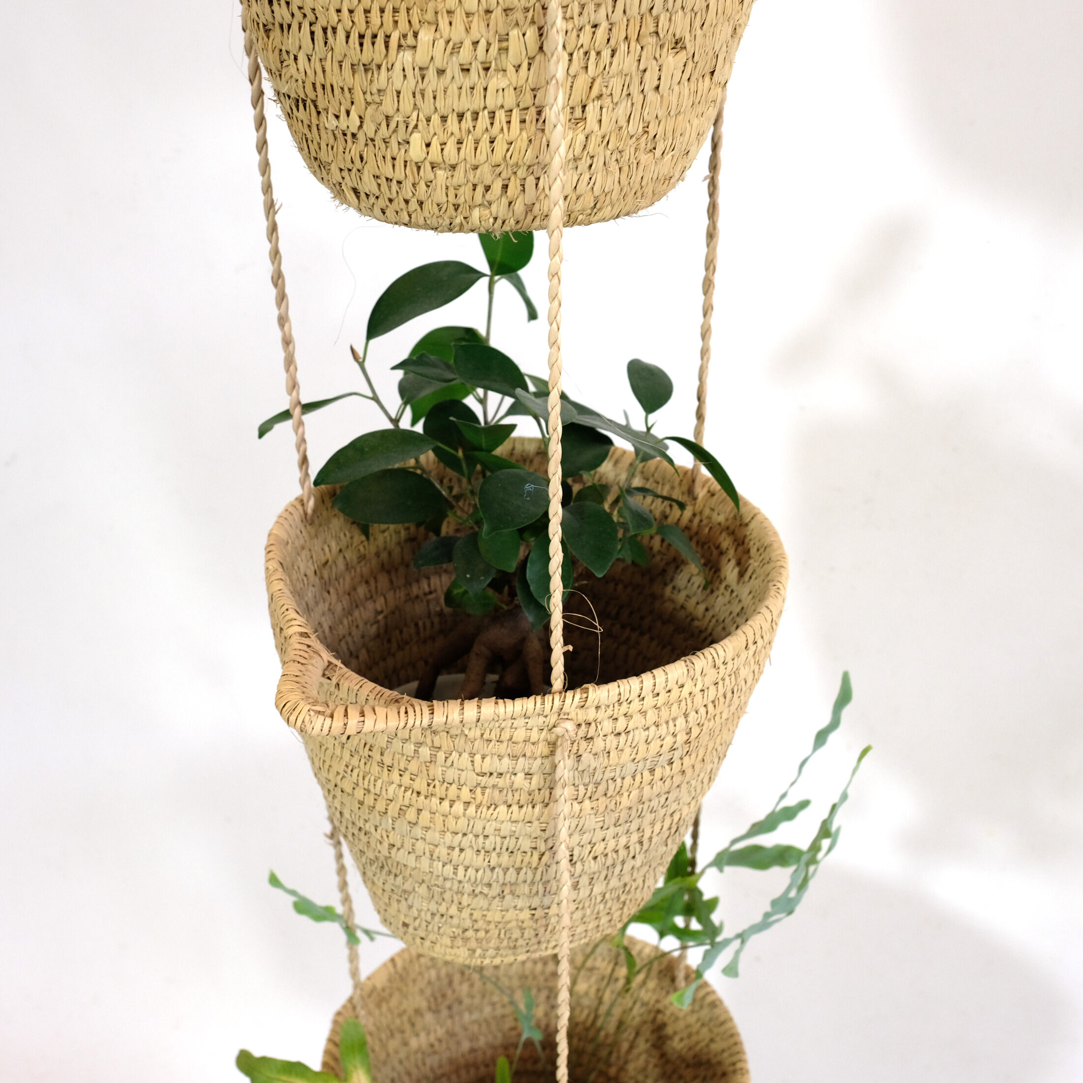 Hanging baskets made of natural fiber