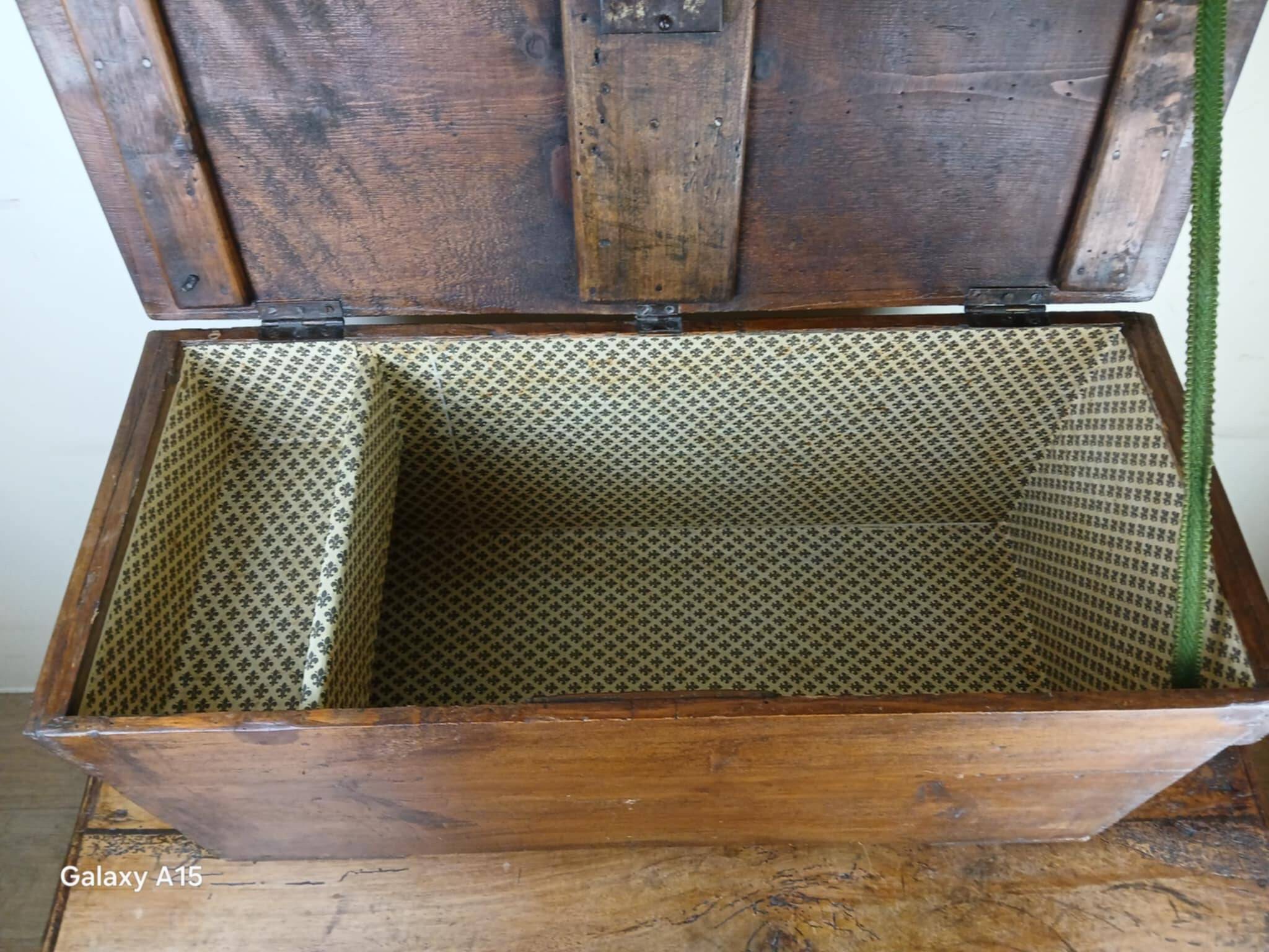 Old solid wood transport chest from the early 19th century