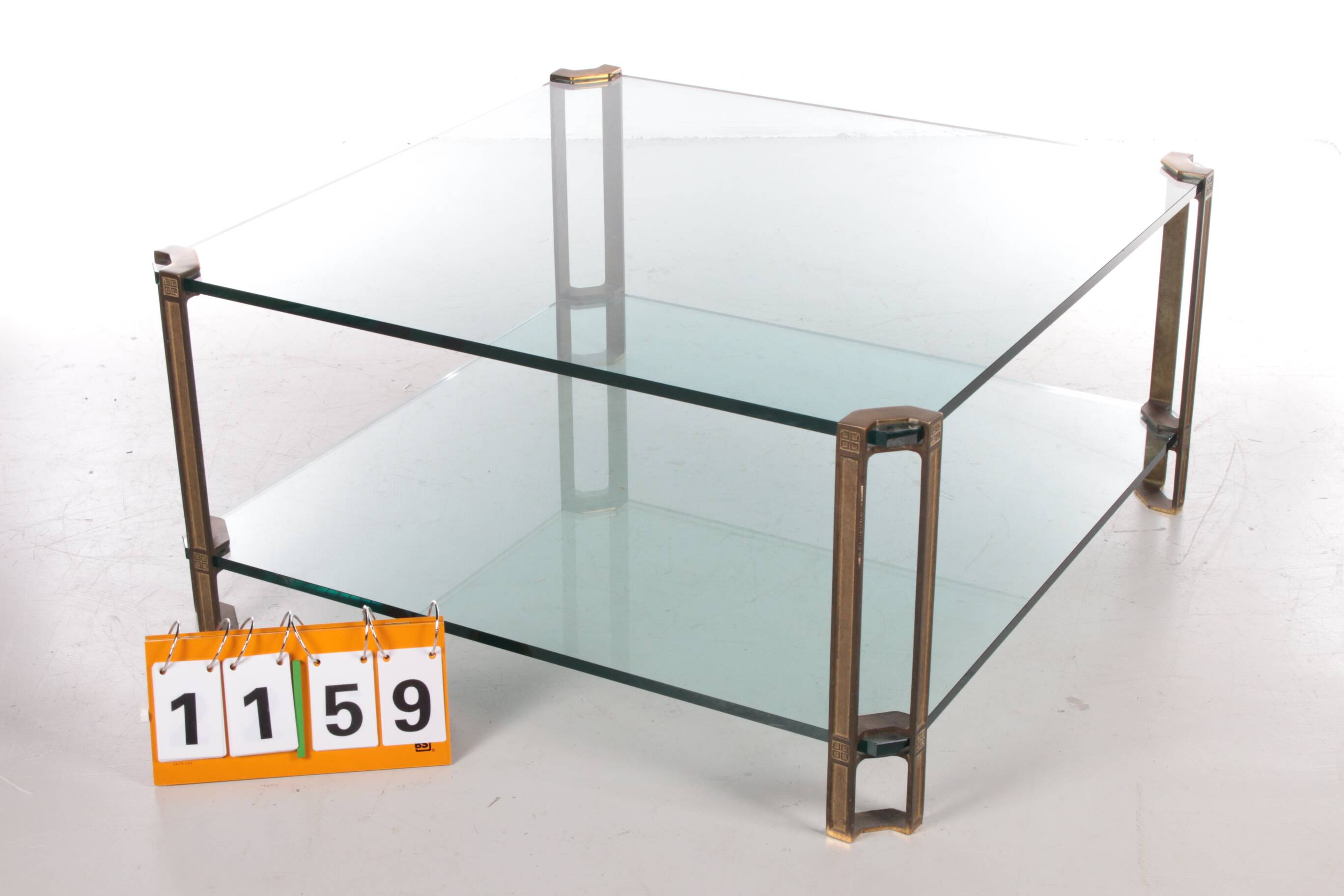 Peter Ghyczy T24D coffee table with brass legs and glass top